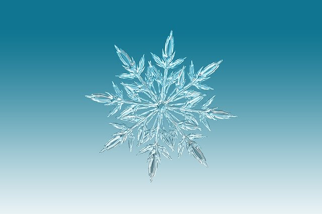 pale blue background with ice snowflake picture